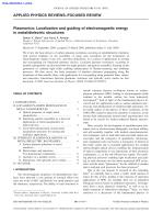 Plasmonics: Localization and guiding of electromagnetic energy in metal/dielectric structures