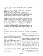 Assessing objective techniques for gauge-based analyses of global daily precipitation