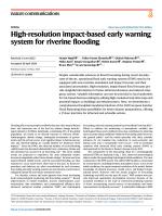 High-resolution impact-based early warning system for riverine flooding